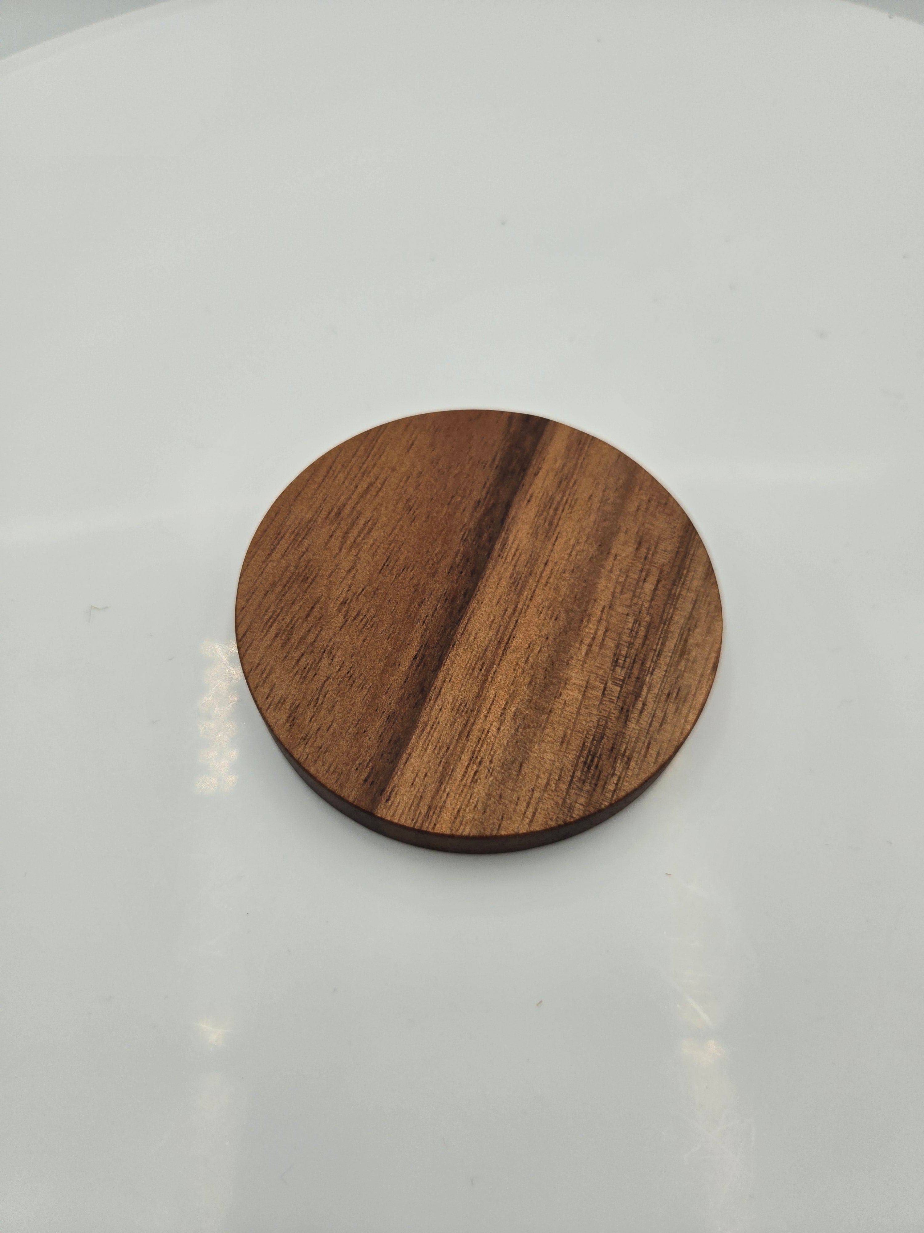 Handcrafted Wooden Coasters | Set of 4 | Natural Wood Drink Coasters with Holder Quantity: Set of 4 Coasters /Coaster Diameter: 7.5 cm (2.95 in) /Coaster Thickness: 0.8 cm (0.31 in) /Weight (Each Coaster): 0.024 kg /Total Set Weight: 0.160 kg.