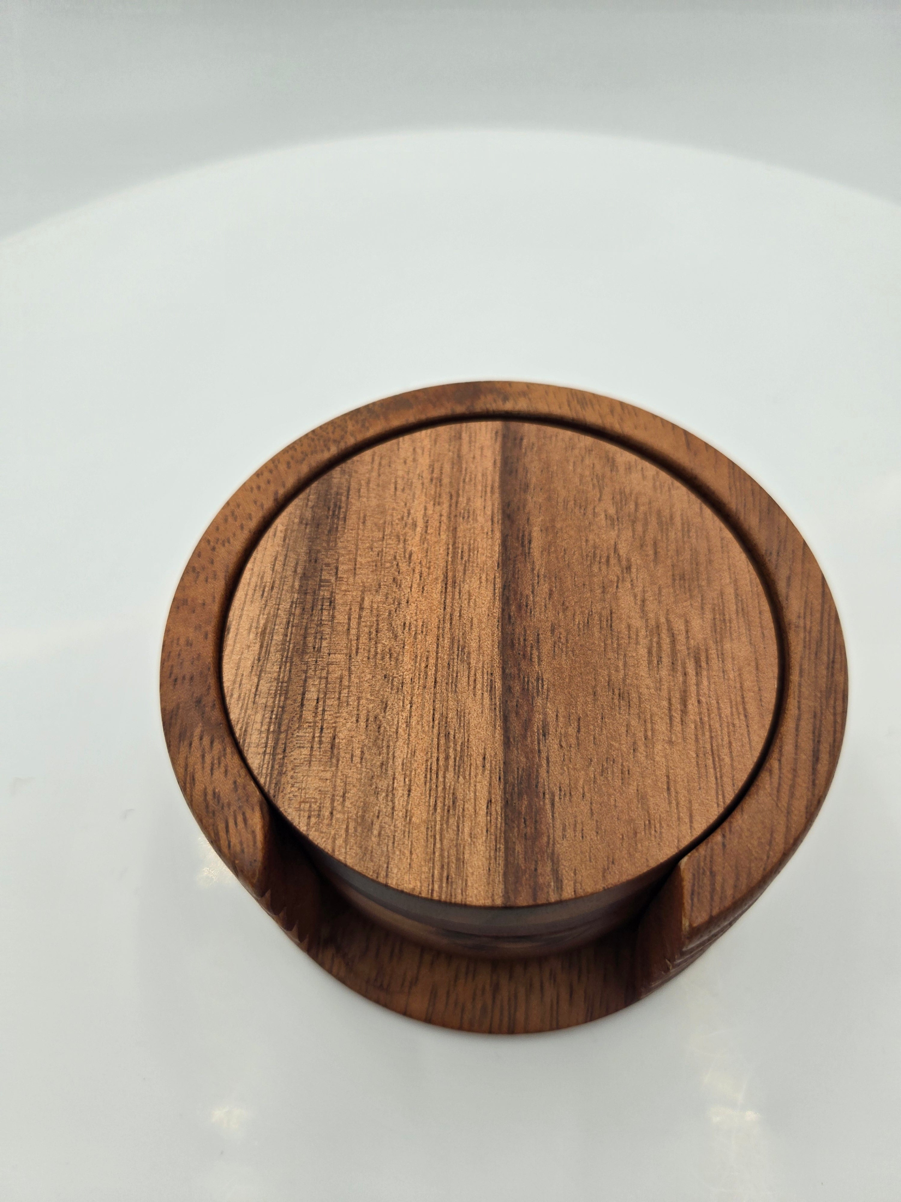 Handcrafted Wooden Coasters | Set of 4 | Natural Wood Drink Coasters with Holder Quantity: Set of 4 Coasters /Coaster Diameter: 7.5 cm (2.95 in) /Coaster Thickness: 0.8 cm (0.31 in) /Weight (Each Coaster): 0.024 kg /Total Set Weight: 0.160 kg.