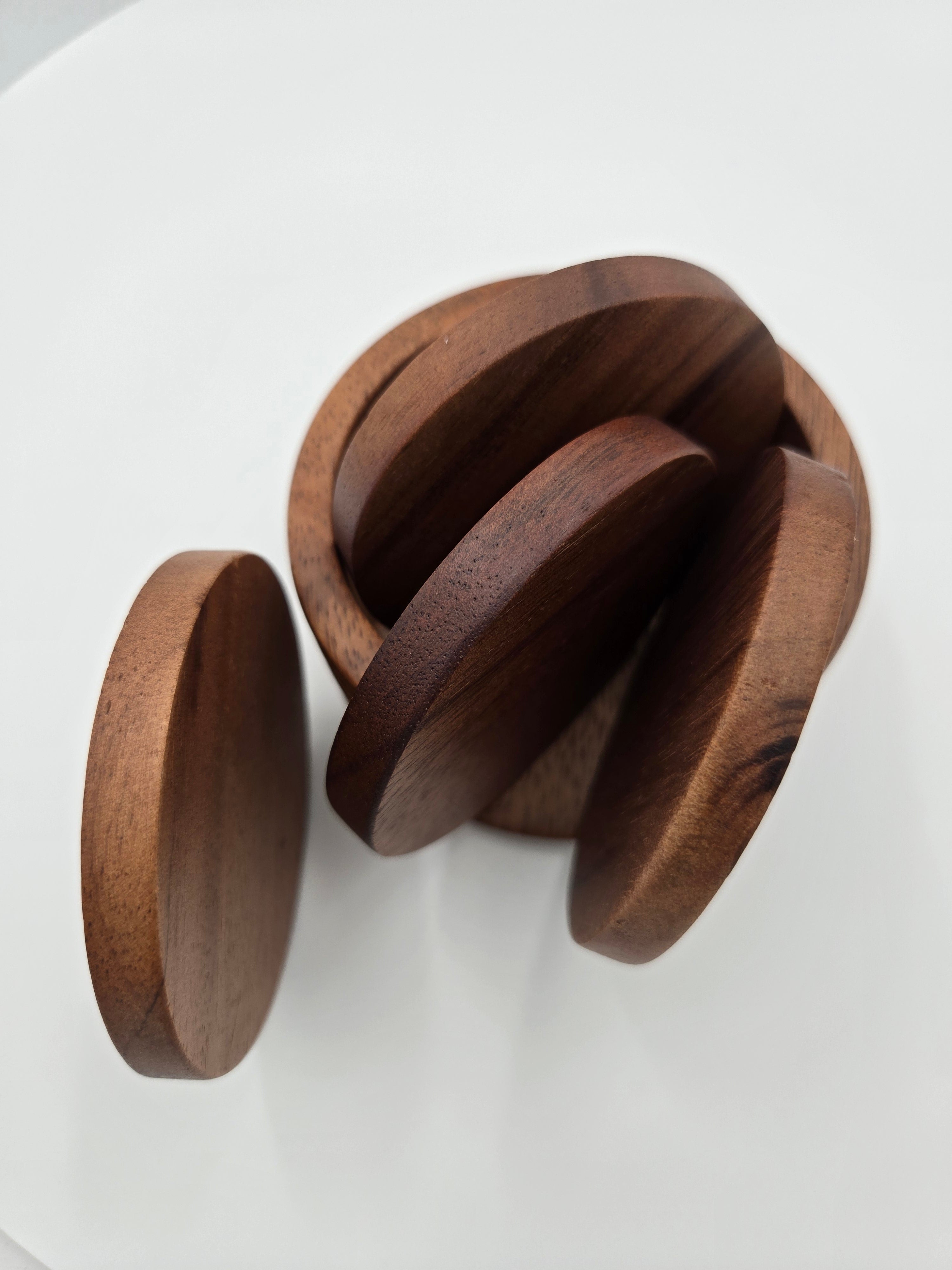 Handcrafted Wooden Coasters | Set of 4 | Natural Wood Drink Coasters with Holder Quantity: Set of 4 Coasters /Coaster Diameter: 7.5 cm (2.95 in) /Coaster Thickness: 0.8 cm (0.31 in) /Weight (Each Coaster): 0.024 kg /Total Set Weight: 0.160 kg.